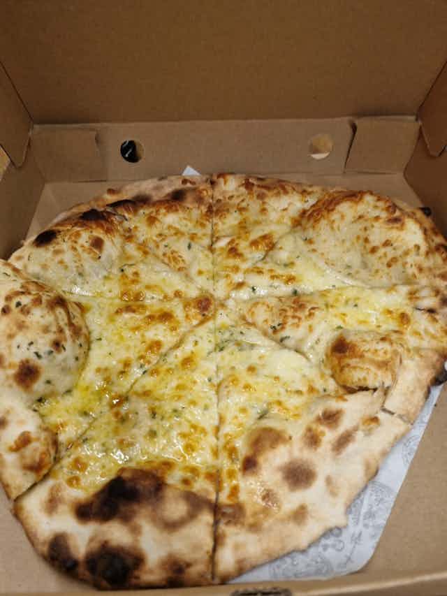 Dough with the Flow Italian style wood fired pizza Book on Togather