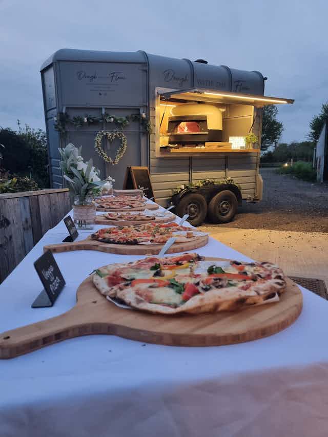 Dough with the Flow Italian style wood fired pizza Book on Togather